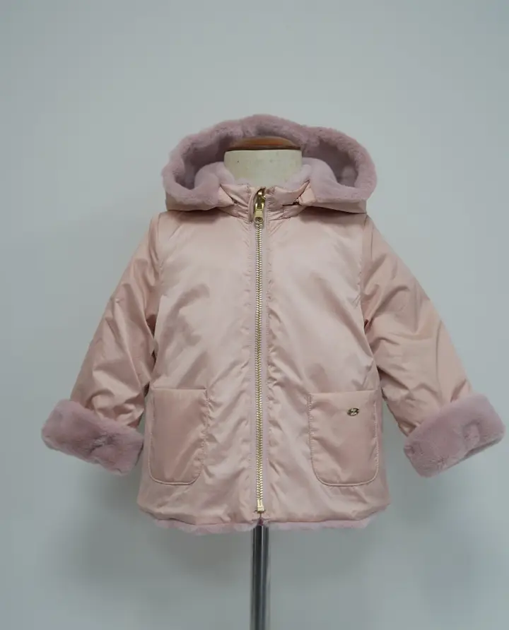 Blush pink hooded children’s coat with plush hood and cuff trim