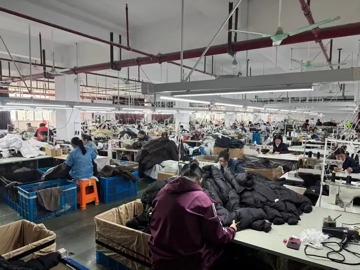 Garment production floor with quilted outerwear in progress